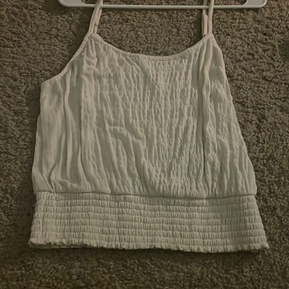 slight crop cream tank top size L juniors. never worn